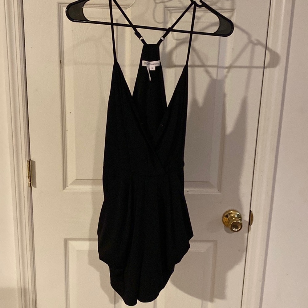 One piece short outfit black.